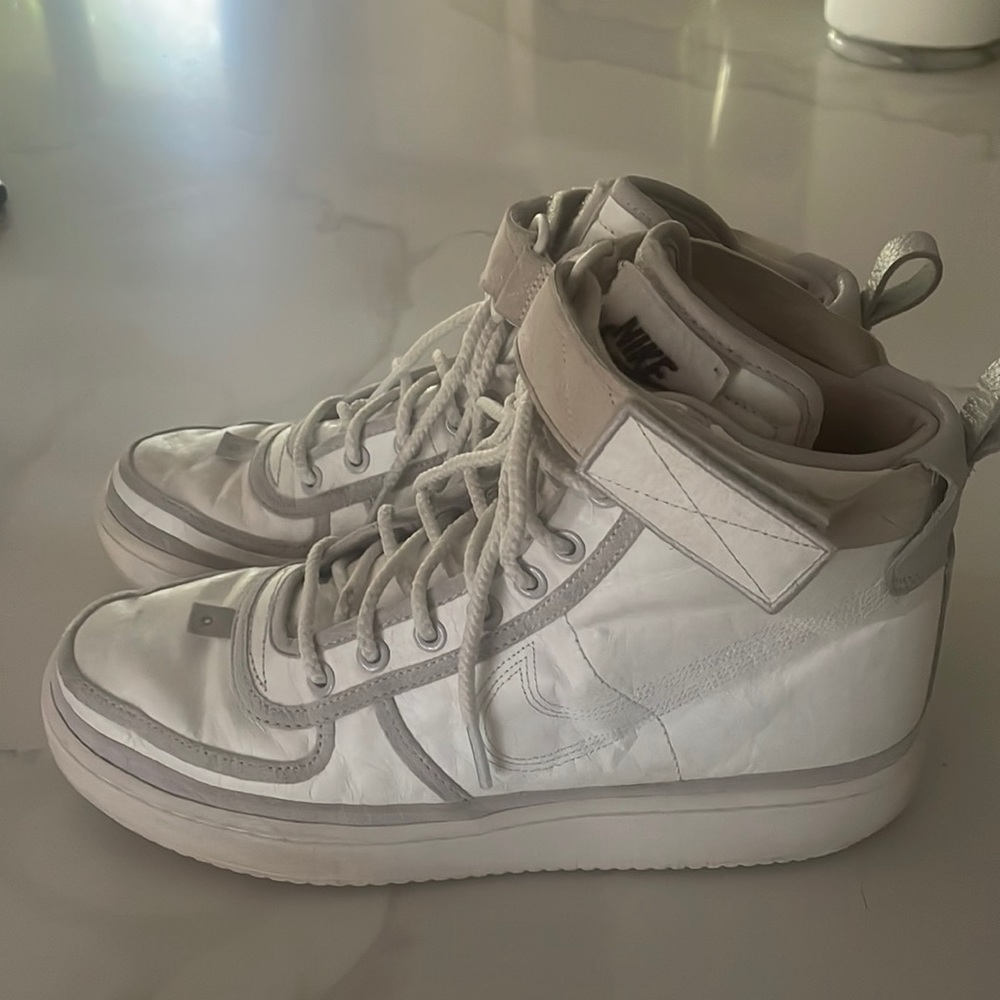 Nike Air Force 1’s / hightop sneakers / white and gray leather